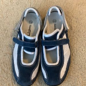 Comfy blue and white Velcro close sneakers. 8 1/2